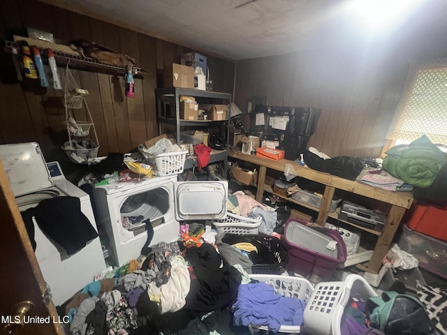 4008 Somerset Dr, Moss Point, MS 39562 - washroom featuring separate washer and dryer and wooden walls