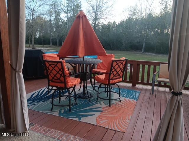 9900 Little Buck, Vancleave, MS 39565 - wooden terrace with view of scattered trees