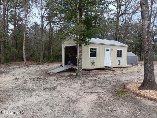 9900 Little Buck, Vancleave, MS 39565 - view of outbuilding with an outbuilding