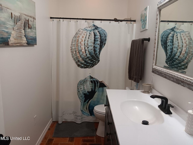 9900 Little Buck, Vancleave, MS 39565 - full bath featuring baseboards, vanity, toilet, and brick patterned flooring