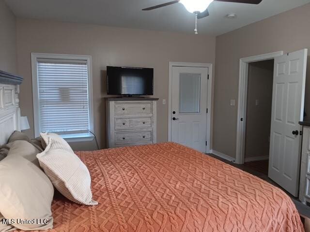 9900 Little Buck, Vancleave, MS 39565 - bedroom featuring a ceiling fan and baseboards