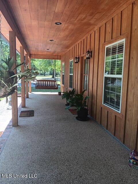 9900 Little Buck, Vancleave, MS 39565 - view of patio / terrace with covered porch