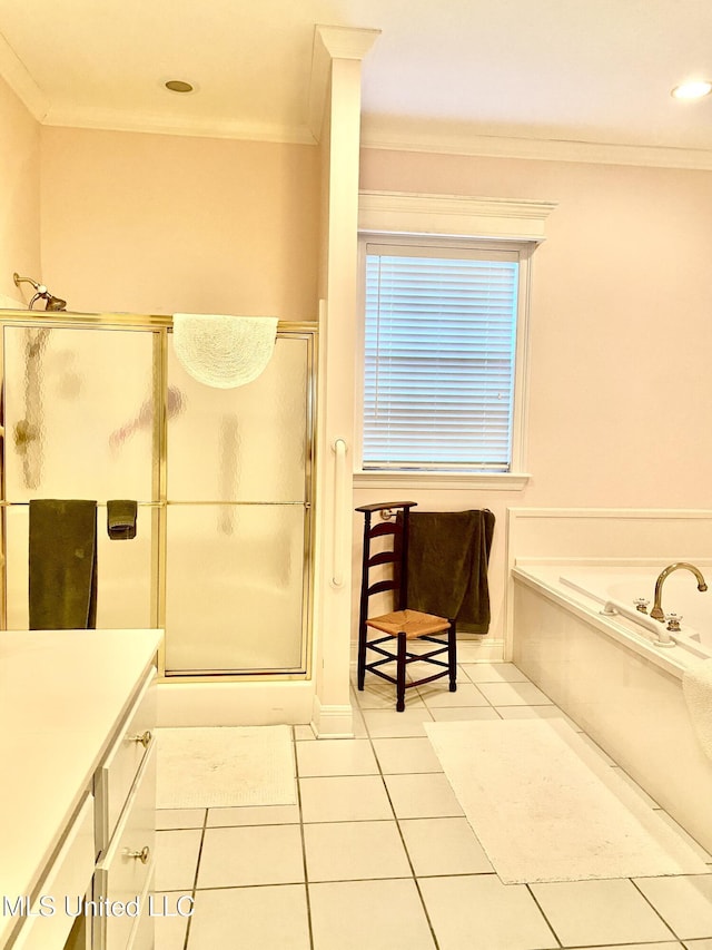 bathroom with tile patterned flooring, vanity, crown molding, and independent shower and bath