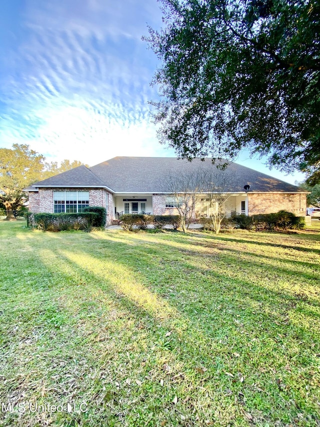 view of front of home with a front yard