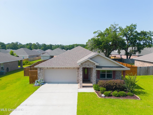 140 Rosie Dr, Long Beach, MS 39560 - view of front of house with a garage, concrete driveway, and roof with shingles