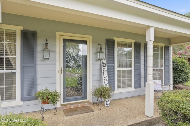725 Bay Tree Dr, Flowood, MS 39232 - doorway to property with a porch