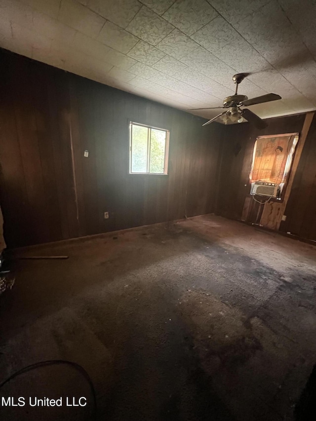 200 Pineridge St, Utica, MS 39175 - empty room with a ceiling fan and wood walls