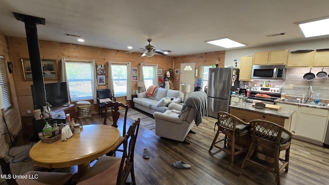 22386 Ms Highway 32, Oakland, MS 38948 - dining space featuring wood finished floors, visible vents, and ceiling fan