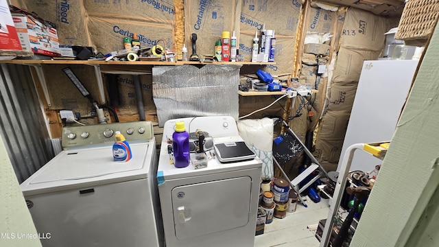 22386 Ms Highway 32, Oakland, MS 38948 - washroom featuring a workshop area, laundry area, and separate washer and dryer