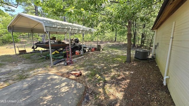 22386 Ms Highway 32, Oakland, MS 38948 - view of yard featuring a detached carport and central AC unit