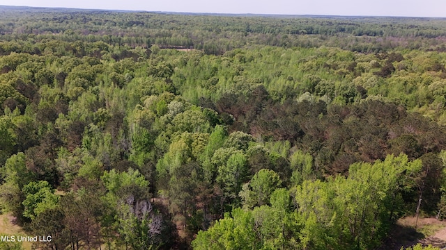 22386 Ms Highway 32, Oakland, MS 38948 - birds eye view of property featuring a wooded view