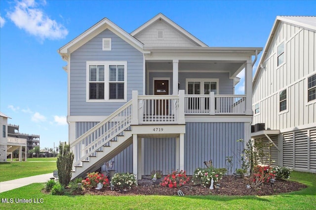 view of front of home with a front lawn and a porch