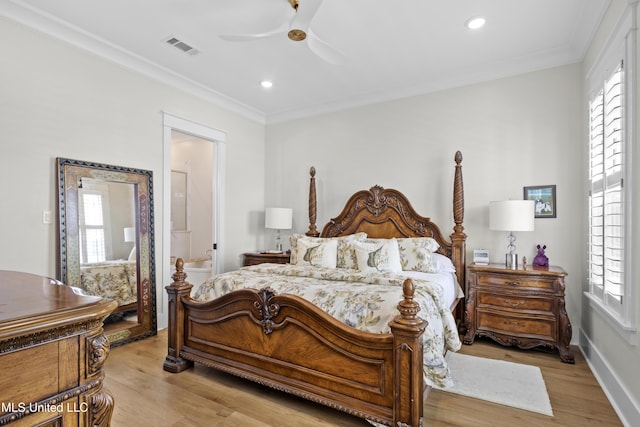 bedroom featuring ceiling fan, light wood-type flooring, multiple windows, and ornamental molding