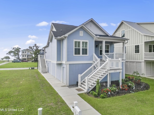 view of front facade featuring covered porch and a front yard