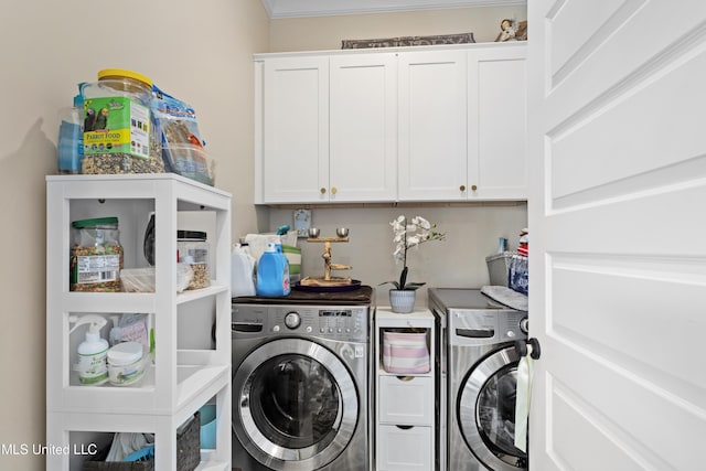 washroom with independent washer and dryer, ornamental molding, and cabinets