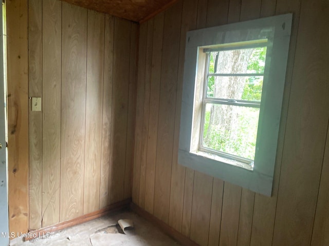 1717 9th Ave, Meridian, MS 39301 - spare room featuring wooden walls and baseboards