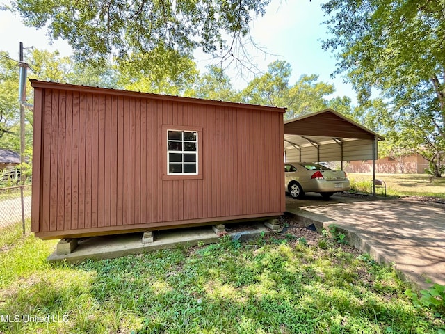 view of property exterior with a carport