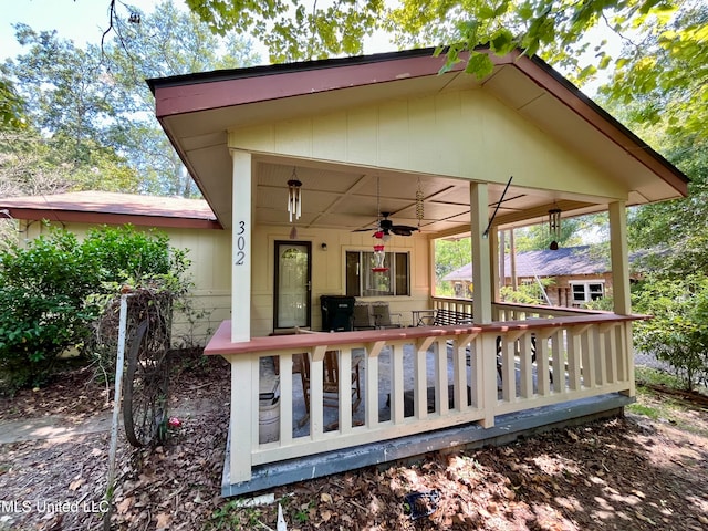 wooden deck with ceiling fan