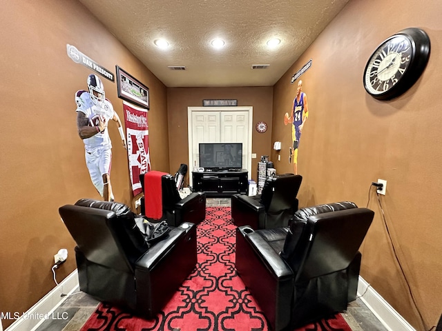 121 Vinca Dr, Madison, MS 39110 - cinema room with baseboards and a textured ceiling