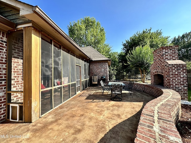 121 Vinca Dr, Madison, MS 39110 - view of patio / terrace with a fireplace and outdoor dining space