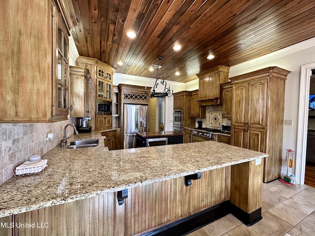 121 Vinca Dr, Madison, MS 39110 - kitchen with appliances with stainless steel finishes, a sink, wood ceiling, recessed lighting, and tasteful backsplash
