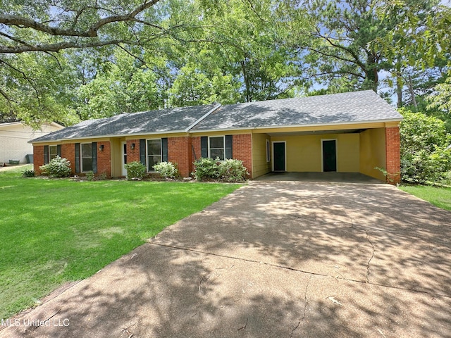 1008 Normandy Dr, Clinton, MS 39056 - ranch-style home with concrete driveway, a front lawn, brick siding, and an attached carport