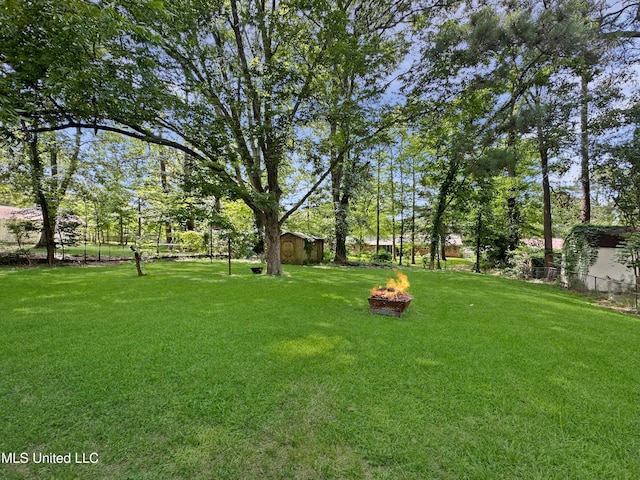 1008 Normandy Dr, Clinton, MS 39056 - view of yard featuring an outdoor fire pit