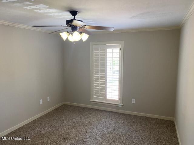 4 Foxcroft Ct, Madison, MS 39110 - carpeted spare room featuring crown molding, a ceiling fan, and baseboards