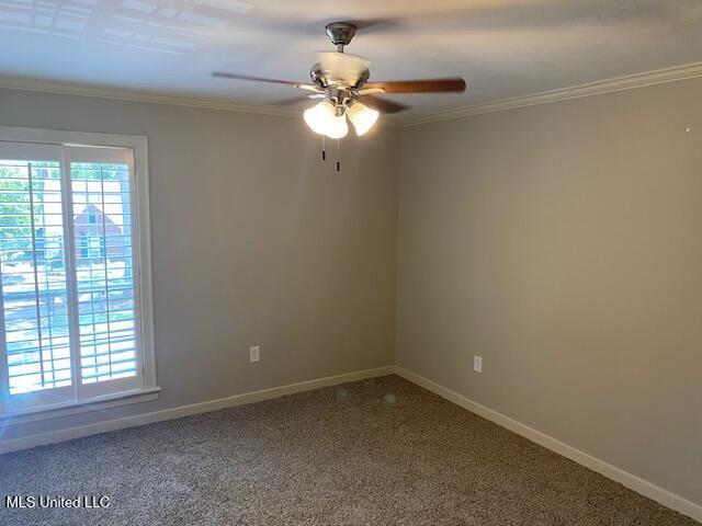 4 Foxcroft Ct, Madison, MS 39110 - empty room featuring a ceiling fan, baseboards, carpet, and ornamental molding