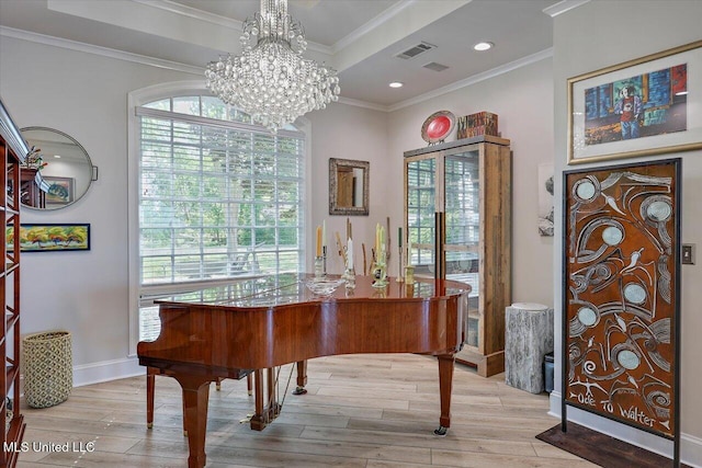205 Audubon Point Dr, Brandon, MS 39047 - office featuring visible vents, wood finished floors, baseboards, a notable chandelier, and ornamental molding