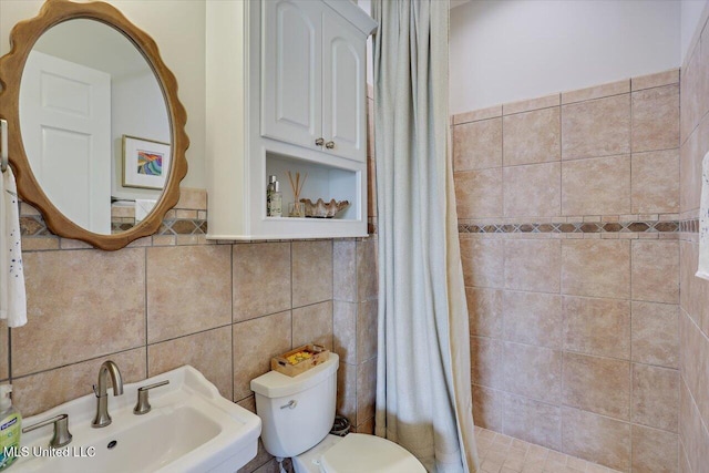 205 Audubon Point Dr, Brandon, MS 39047 - bathroom featuring decorative backsplash, tile walls, a sink, toilet, and tiled shower