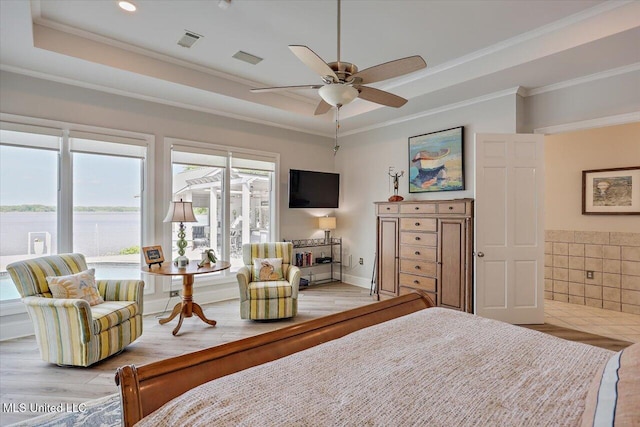 205 Audubon Point Dr, Brandon, MS 39047 - bedroom with visible vents, a raised ceiling, crown molding, and light wood finished floors
