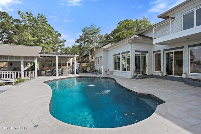205 Audubon Point Dr, Brandon, MS 39047 - view of swimming pool with a fenced in pool, outdoor dry bar, and a patio area