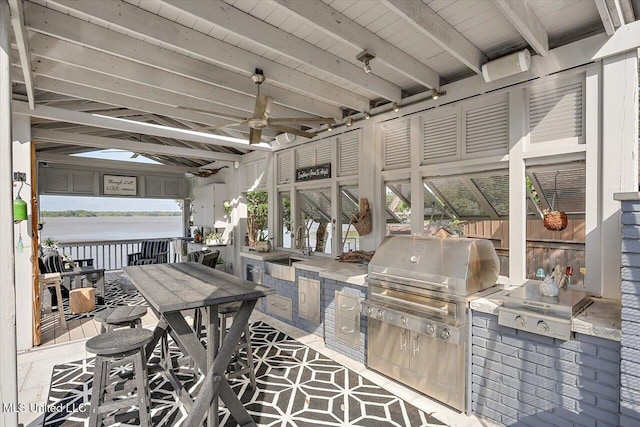 205 Audubon Point Dr, Brandon, MS 39047 - view of patio / terrace featuring a sink, a water view, and exterior kitchen