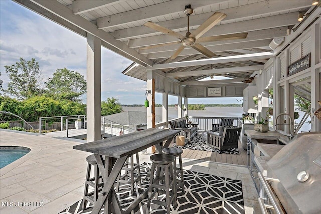 205 Audubon Point Dr, Brandon, MS 39047 - wooden terrace featuring fence, a sink, a patio, a fenced in pool, and a ceiling fan