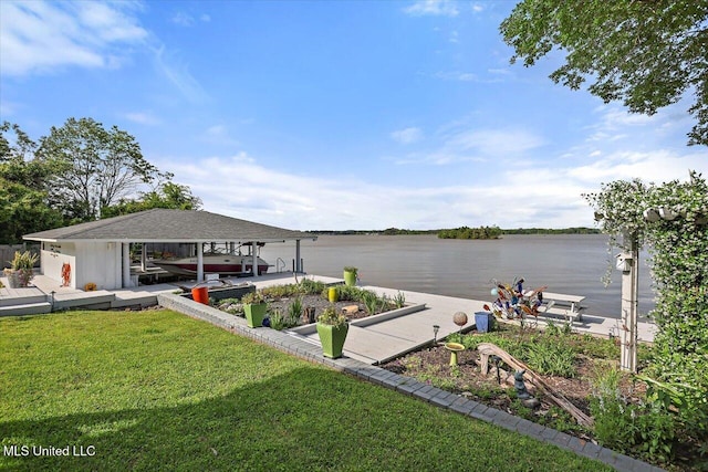 205 Audubon Point Dr, Brandon, MS 39047 - view of dock featuring a water view, boat lift, and a yard
