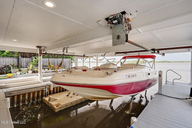 205 Audubon Point Dr, Brandon, MS 39047 - view of dock with boat lift and fence