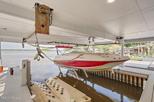 205 Audubon Point Dr, Brandon, MS 39047 - view of dock with a water view and boat lift