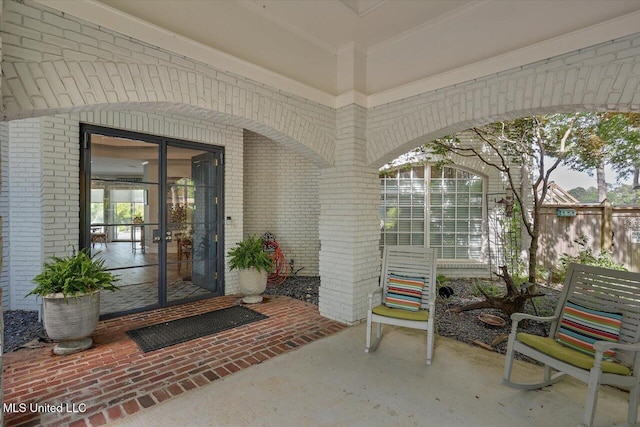 205 Audubon Point Dr, Brandon, MS 39047 - entrance to property with brick siding, fence, and a patio area