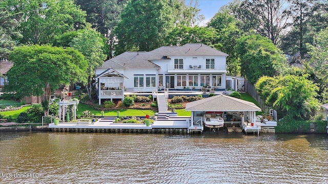 205 Audubon Point Dr, Brandon, MS 39047 - rear view of property featuring a water view, a detached carport, boat lift, and stairway