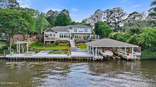 205 Audubon Point Dr, Brandon, MS 39047 - view of dock featuring fence, boat lift, a water view, and stairs