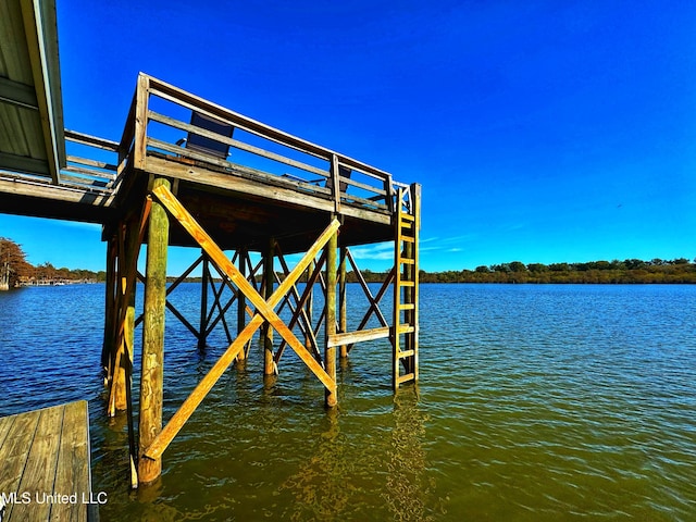 view of dock with a water view