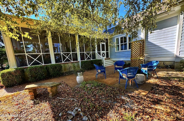 rear view of house with a patio