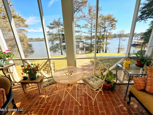 sunroom with a water view