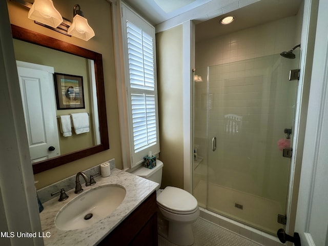 bathroom with a shower stall, vanity, toilet, tile patterned flooring, and recessed lighting