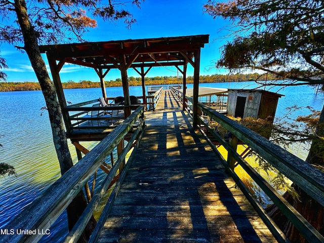 view of dock with a water view