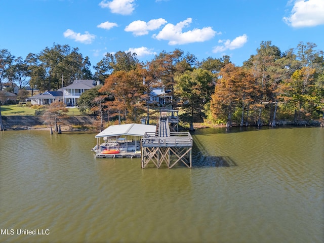 dock area featuring a water view and boat lift