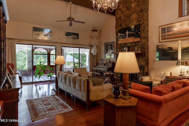 144 Gum Branch To Highway 25 Road, Louisville, MS 39339 - living room with a ceiling fan, wood finished floors, high vaulted ceiling, a chandelier, and a stone fireplace