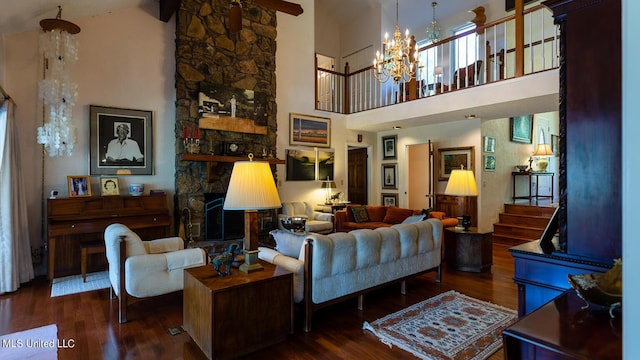 144 Gum Branch To Highway 25 Road, Louisville, MS 39339 - living area with wood finished floors, a fireplace, a chandelier, and high vaulted ceiling