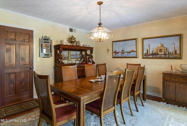 144 Gum Branch To Highway 25 Road, Louisville, MS 39339 - dining space with a chandelier, crown molding, and wood finished floors